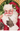 A close-up watercolor-style portrait of Santa Claus pointing his finger, with red suit, white beard, green holly leaves, and a gold oval frame visible around the top edge.