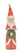 A distressed, hand-painted wooden Santa Claus figurine holding a green glittery wreath with a bell inside, set against a plain white background.