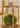 greenery ball inside gold lantern