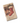 A hardcover notebook with a vintage Christmas design, featuring a red stocking with green pine branches and red berries hanging over a fireplace on a sheet music background, shown on a white background.