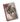 A hardcover notebook or journal featuring a vintage-style illustration of a dark horse with red holiday poinsettias and snow on the cover, with a red spine and visible page edges.