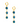 gold huggie hoop earring with navy crystal dangle earring on white backdrop
