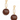 A pair of gold-tone drop earrings featuring a round cream pearl stud at the top, an elongated open-link chain, and a large faceted brown marbled bead below, shown on a white background.