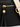 Close-up of a black pebbled leather handbag with a gold-tone zipper, tassel detail, and a cream-colored woven strap with a gold buckle.