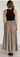 Taupe Black Pleated Midi Skirt flowy hem and block heel styling detail - Current Air