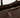 brown tote with gold zipper detail