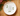 top view of white holiday plate with seasonal message