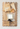 charcuterie board with cheese, crackers, fruits and serving knife
