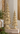 gold resin fir trees on display in home