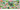 A colorful illustrated map-style graphic titled 'Classic Christmas Movies' with numbered scenes showing festive city scenes, houses, a train, Santa, and movie theater motifs.